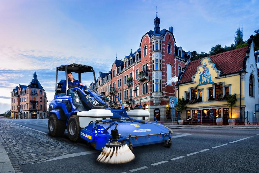 Sweeper with collector box